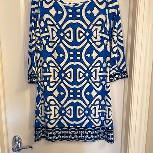 Absolutely adorable and simple dress with geometric print. Wow factor! Size 6.